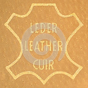 Genuine all natural leather badge label tag, multilingual English, French FR cuir, German DE Leder golden printed text icon