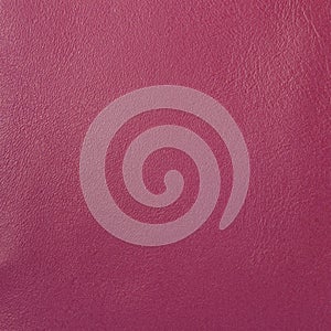 Genuine leather texture close-up, pink color, trendy background. Modern accessories, shopping, manufacturing