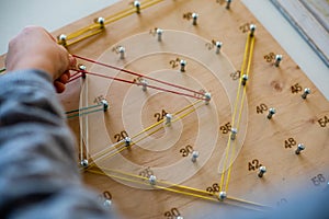 Geoboard for developing mathematical thinking and problem solving skills