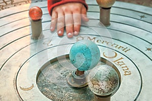 The geocentric model of the solar system. The earth is in the center of the universe, the sun revolves around the planet photo
