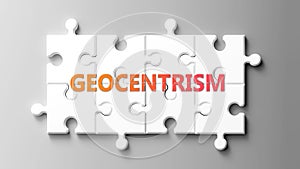 Geocentrism complex like a puzzle - pictured as word geocentrism on a puzzle pieces photo