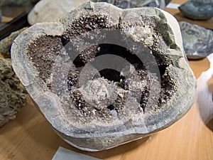 Geode filled with crystals of ferruginous dolomite and white calcite