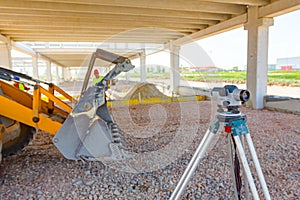 Geodesist device on tripod on a building site