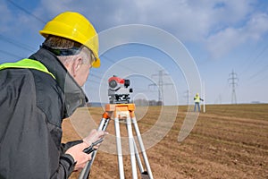 Geodesist measure land speak transmitter photo