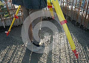 geodesy specialist works on a construction site