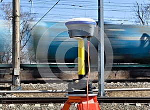 Geodetic GNSS receiver in the field in Siberia, mounted on a tripod