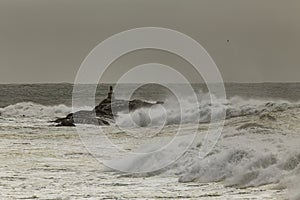 Geodetic landmark on a sea cliff