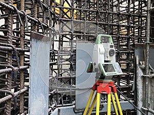 Geodetic total station at construction site. Survey equipment on tripod
