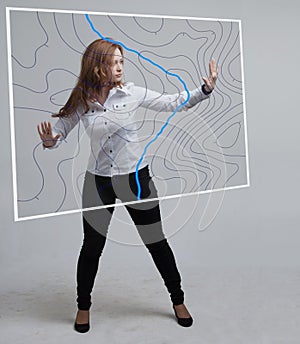 Geographic information systems concept, woman scientist working with futuristic GIS interface on a transparent screen.