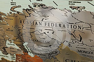 Geographic Map Made of Metallic Material with the Russian territories in the Foreground