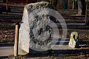 The geological exposition in the city park is for the education of students walking along the path and reading about the geologica photo