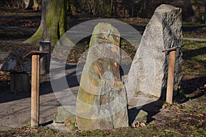 The geological exposition in the city park is for the education of students walking along the path and reading about the geologica photo