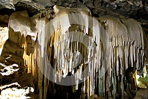 White courtain formation in Interior of the MaquinÃ© cave in the city of Cordisburgo, Minas Gerais state, Brazil photo