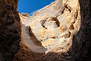 Geological formation of sandstones from Benagil cave in Portugal