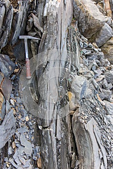 Geological hammer on the rocks