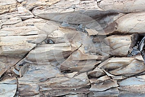Geological layers of earth - layered rock background photo