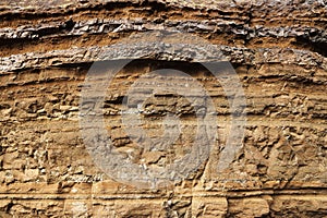 Geological layers of earth - layered rock. Close-up of sedimentary rock in Iceland.