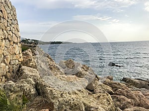 Geological rocks, sea stones on seashore. Photo