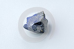 Geology of natural healing spirituality and beauty. Untouched jewels. Dumortierite rock. White background