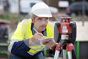 geometer at work at construction site