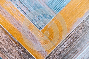 Geometric blue and orange tile pattern texture .