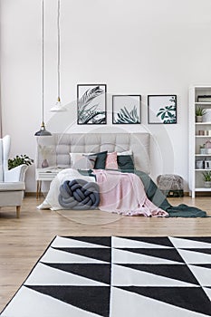 Geometric carpet in bedroom interior