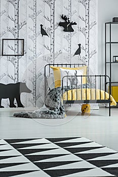 Geometric carpet in child`s bedroom