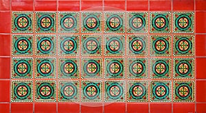 Geometric ceramic tiles mosaic with a red border