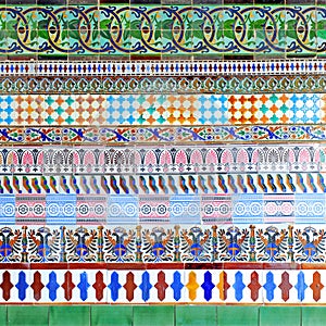 Geometric composition with old colorful tiles made in Seville, Spain