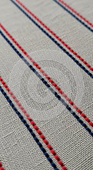 Geometric landscape featuring several white pyramidal structures composed of thin