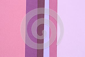 Geometric paper background from purple and pink. Copy space, place for your text. Top view