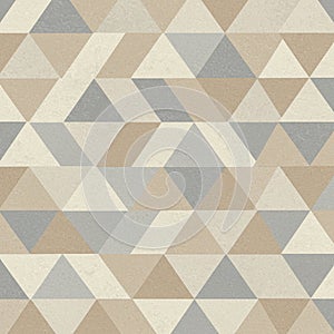 Geometric pattern composed of repeating triangles in shades of beige, brown, and