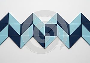 Geometric pattern composed of triangular tiles in alternating