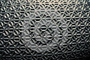 close up of a cubic textures on grey background