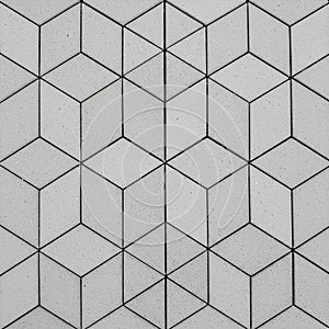 Geometric pattern featuring interlocking cubes, creating a three-dimensional optical