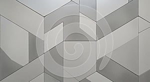 Geometric pattern featuring interlocking rectangular shapes in shades of gray. The design creates a
