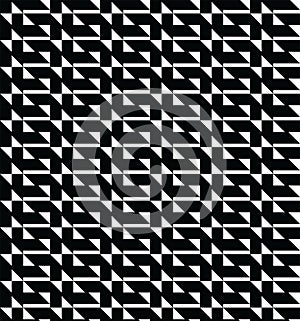 Geometric pattern featuring a repeating design of black and white shapes.
