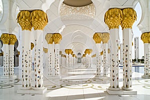 Columns and arabesques of Grand Mosque Abu Dhabi photo