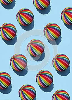 Geometric pattern of Rainbow Sphere on a bright blue background, top view