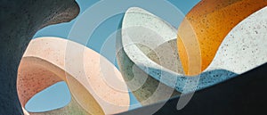 Geometric sculptures showcase contrasting materials and textures in a creative composition