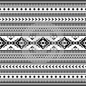 Geometric seamless pattern with Aztec tribal motives in black and white colors.