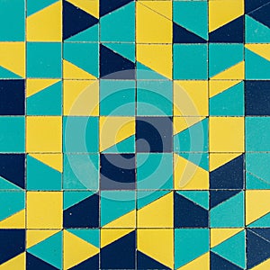 Geometric tile pattern featuring a grid of squares divided into triangles. Colors include