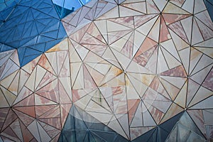 Geometric triangle pattern background on wall.