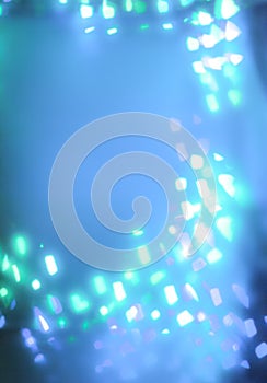 Geometric white bokeh lights on blue background