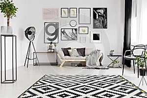 Geometrical rug in living room photo