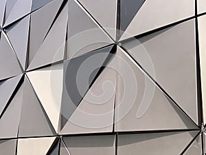 Geometrical triangular shape on metal building wall