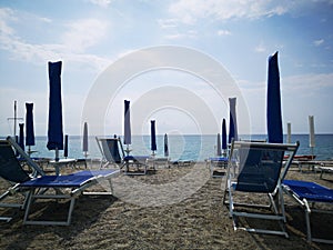 Geometries of umbrellas and deckchairs on the Italian beaches