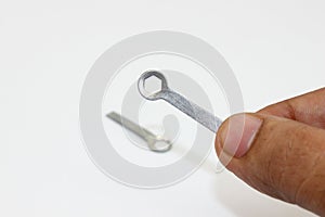 Geometry compass key isolated on white background with selective focus