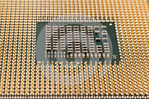 Geometry electronics, closeup of CPU Processor Chip, view from the bottom side, pin connectors