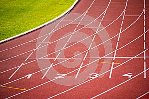 Geometry of White Lines and Numbered Lanes on the Bold Canvas of a Red Track - Track and Field Illustration Photo for Worlds in